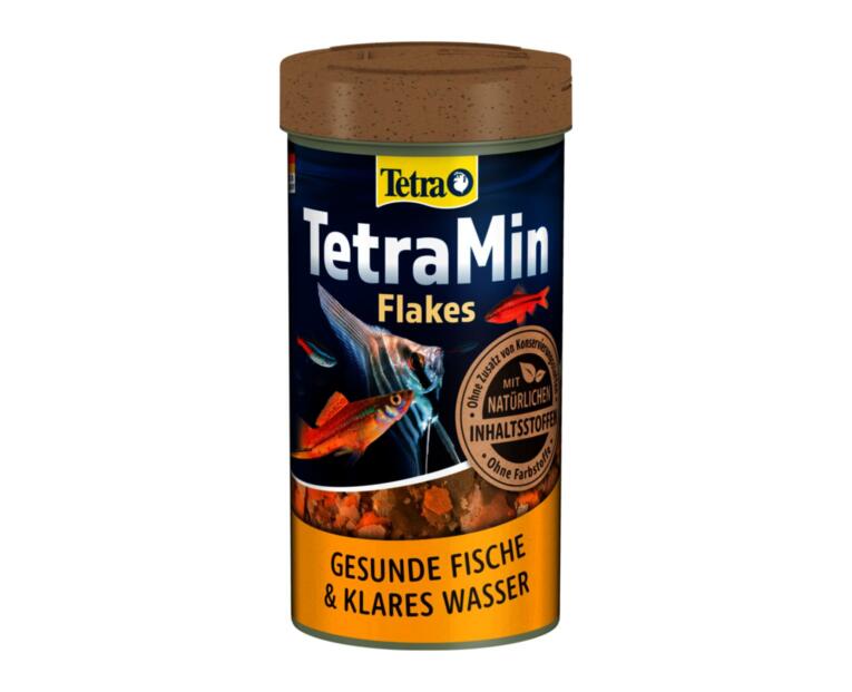 Embalagem de TetraMin Flakes comida para peixes tropicais em flocos.